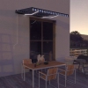 Toldo con LED y sensor de viento azul y blanco 300x250 cm