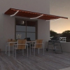 Toldo automático LED sensor de viento naranja marrón 600x350 cm