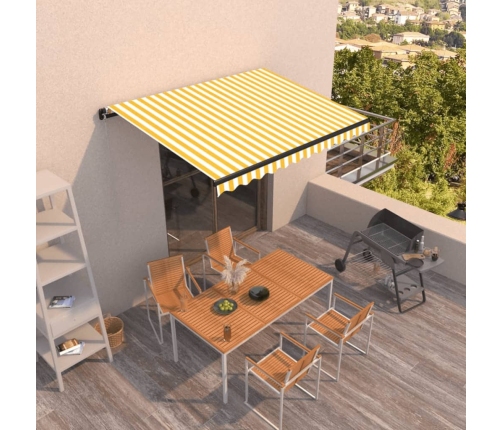 Toldo retráctil manual amarillo y blanco 350x250 cm