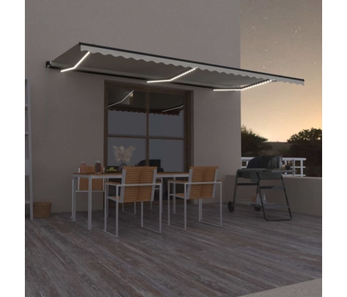 Toldo retráctil manual con luz LED color crema 600x350 cm