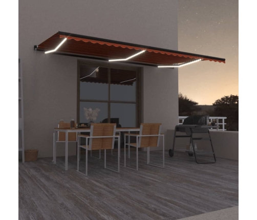 Toldo retráctil manual con luz LED naranja y marrón 600x350 cm