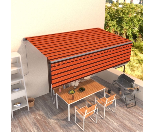 Toldo retráctil manual con persiana naranja y marrón 5x3 m