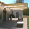 Toldo manual retráctil con LED amarillo y blanco 600x350 cm