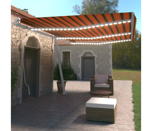 Toldo manual retráctil con LED naranja y marrón 600x350 cm