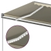 Toldo retráctil manual con luz LED crema 6x3,5 m