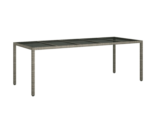 vidaXL Mesa de jardín de vidrio templado ratán PE gris 250x100x75 cm