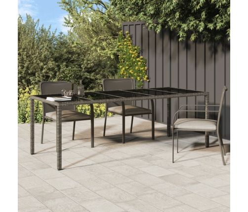 vidaXL Mesa de jardín de vidrio templado ratán PE gris 250x100x75 cm