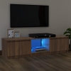 Mueble de TV con luces LED marrón roble 140x40x35,5 cm