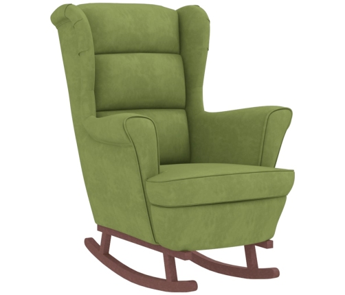 Sillón mecedora patas madera y taburete terciopelo verde claro