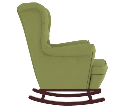 Sillón mecedora patas madera y taburete terciopelo verde claro