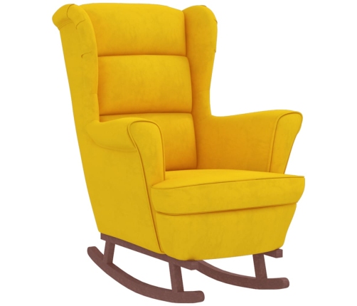 Sillón mecedora patas madera y taburete terciopelo amarillo