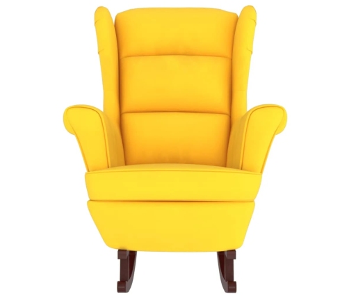 Sillón mecedora patas madera y taburete terciopelo amarillo