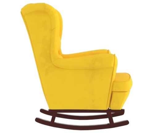 Sillón mecedora patas madera y taburete terciopelo amarillo