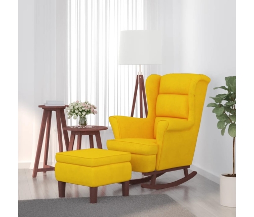 Sillón mecedora patas madera y taburete terciopelo amarillo