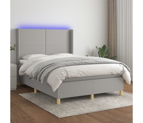 Cama box spring colchón y luces LED tela gris claro 140x200 cm