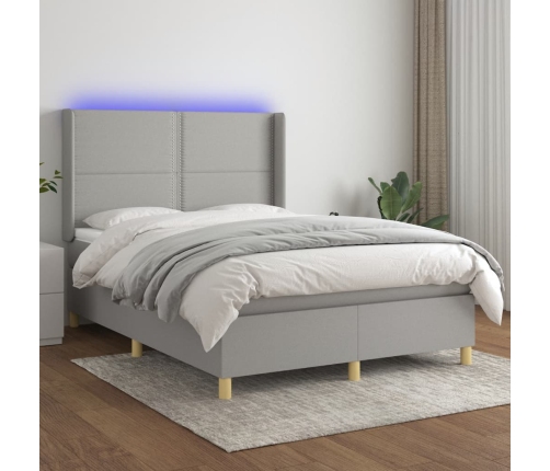 Cama box spring colchón y luces LED tela gris claro 140x190 cm