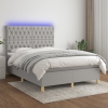 Cama box spring colchón y luces LED tela gris claro 140x200 cm