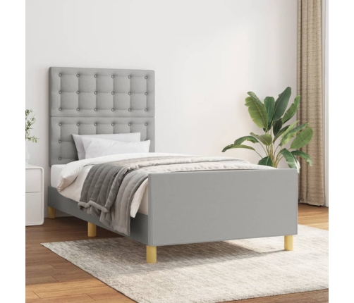 Estructura de cama con cabecero de tela gris claro 90x190 cm