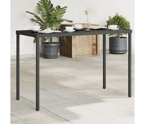 Mesa de jardín superficie de vidrio ratán PE negro 115x54x74 cm