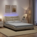 Estructura de cama con luces LED tela crema 140x200 cm