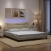 Estructura de cama con luces LED tela crema 180x200 cm