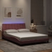 Estructura de cama con luces LED terciopelo rosa 140x190 cm