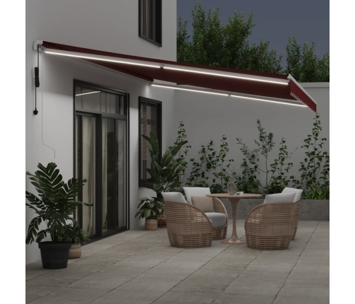 Toldo retráctil automático con luces LED burdeos 600x300 cm