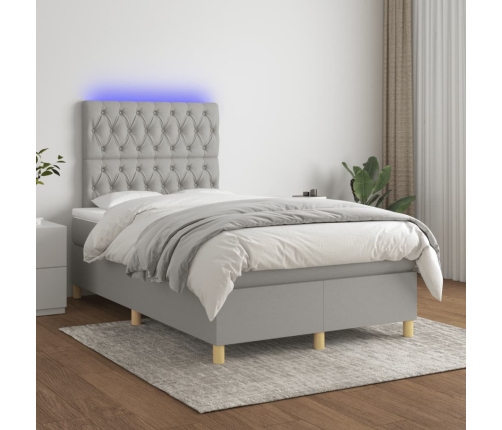 Cama box spring con colchón y LED tela gris claro 120x190 cm