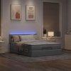 Cama otomana con colchón LED gris claro 140x190 cm tela