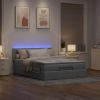 Cama otomana con colchón LED gris claro 140x190 cm tela