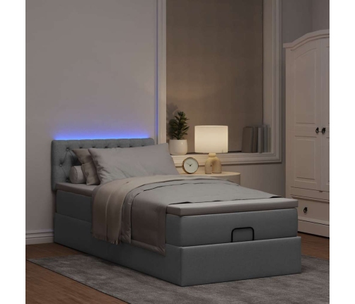 Cama otomana con colchón y LED tela gris claro 90x200 cm