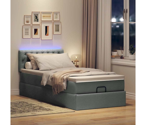 Cama otomana con colchón y LED tela gris oscuro 90x200 cm