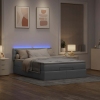 Cama otomana con colchón LED gris claro 140x190 cm tela