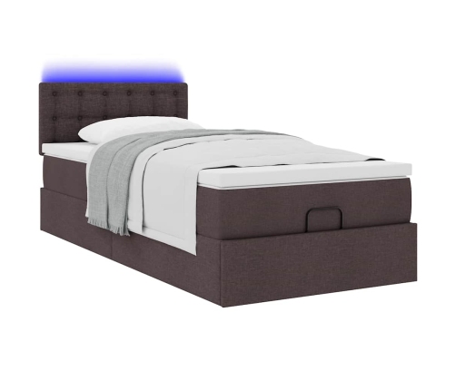 Cama otomana con colchón y LED tela marrón oscuro 90x200 cm