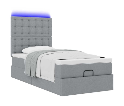 Cama otomana con colchón y LED tela gris claro 90x200 cm