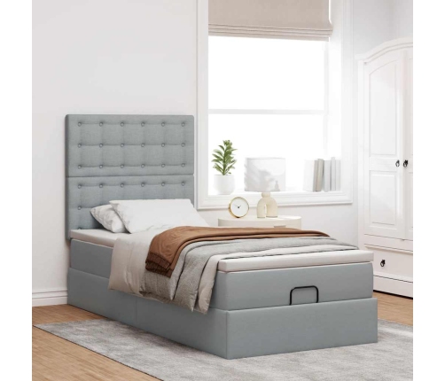 Cama otomana con colchón y LED tela gris claro 90x200 cm