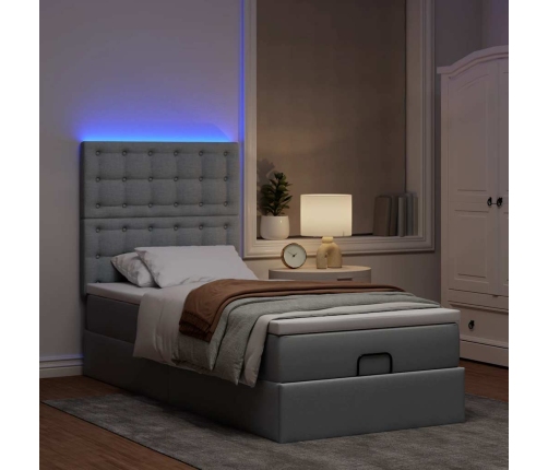 Cama otomana con colchón y LED tela gris claro 90x200 cm
