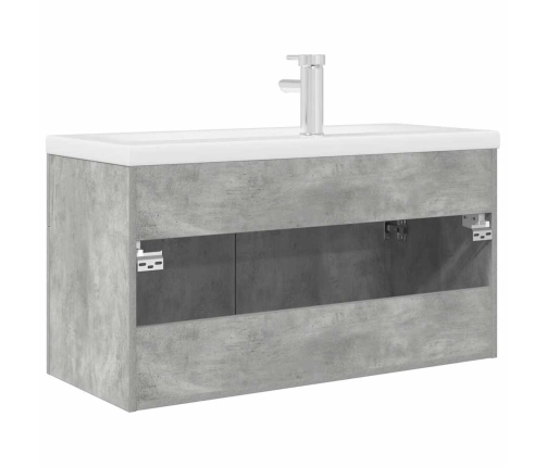 Mueble de baño con lavabo incorporado y grifo gris hormigón