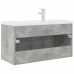 Mueble de baño con lavabo incorporado y grifo gris hormigón