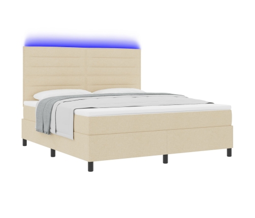 Cama con somier, colchón y luz LED color crema 180x200 cm tela